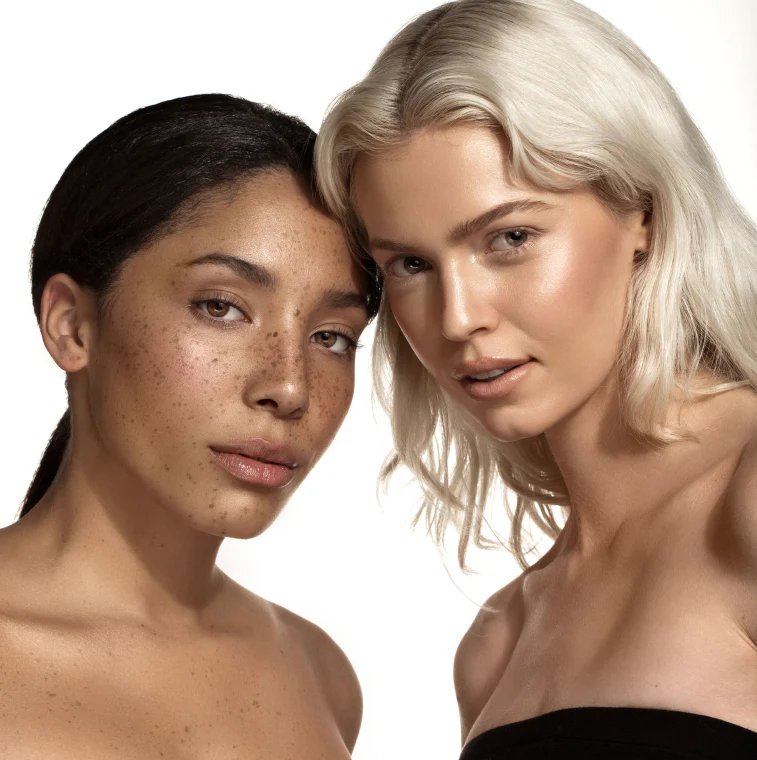 Two models with glowing skin